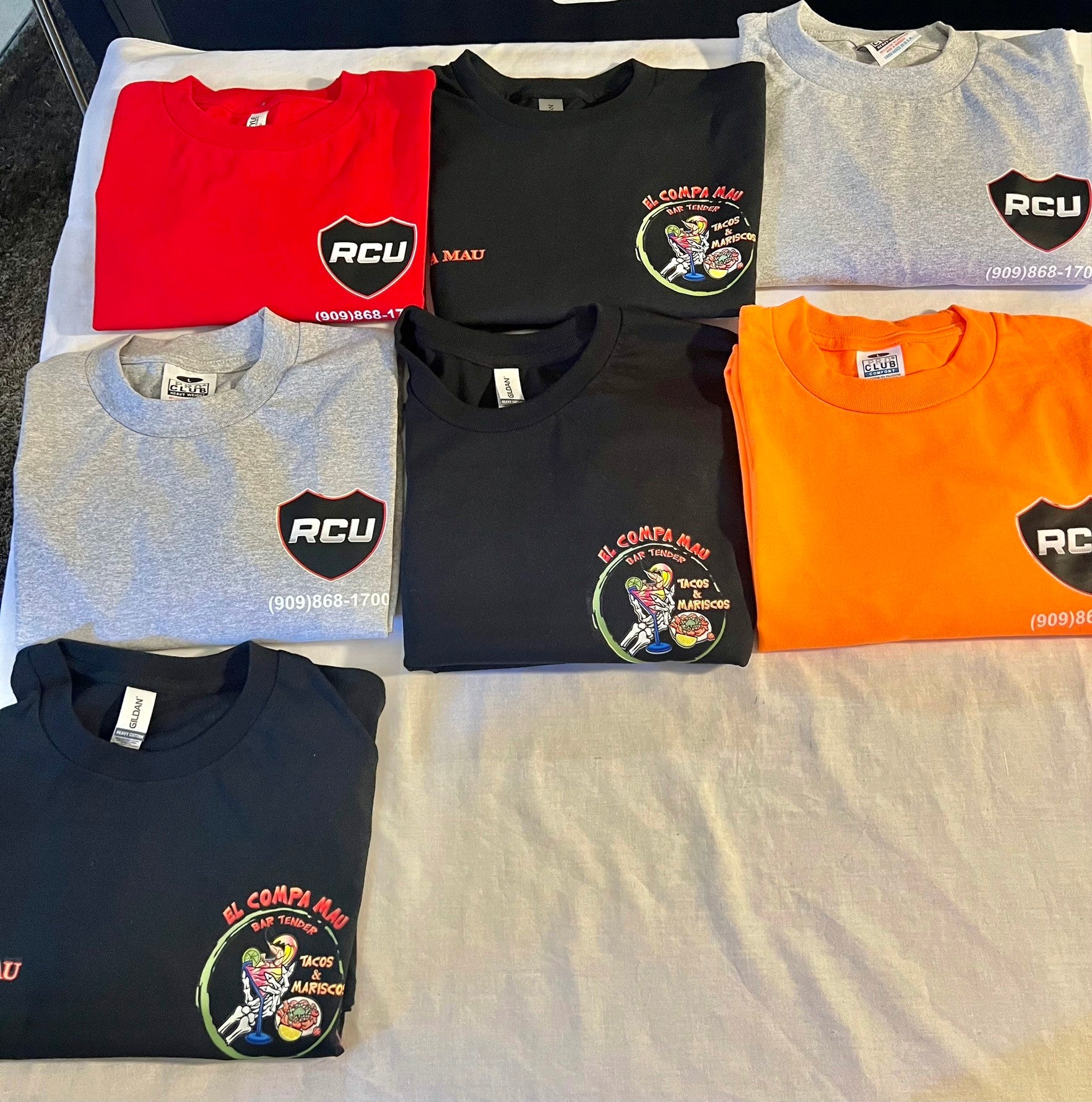 Custom El Compa Mau staff shirts printed by Graphics IE